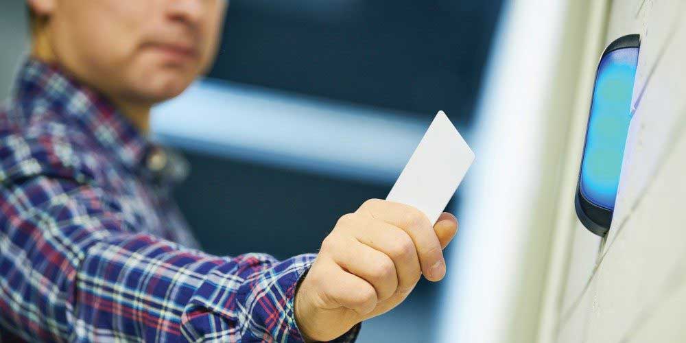 Access Control Reader with person waving credential card in front