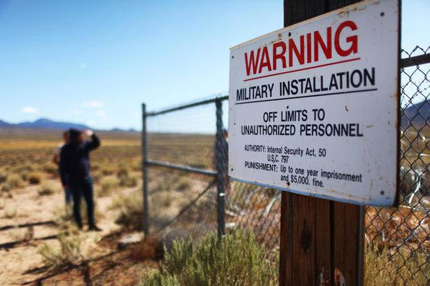 Warning: Military Installation - Off limits to unauthorized personnel - Area 51 sign